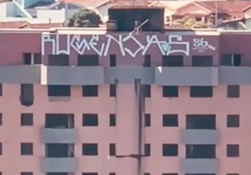Vídeo mostra homem pichando topo de prédio inacabado na Avenida Fátima Porto